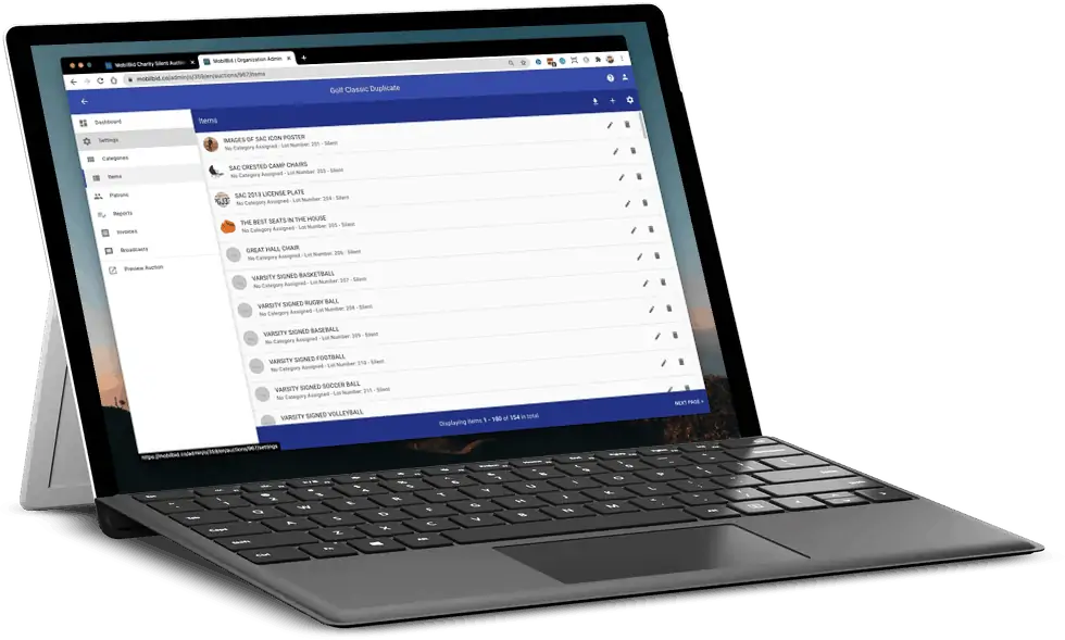 The MobilBid auction dashboard on a laptop